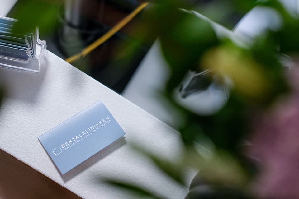 Visitkort fra Dentalklinikken i Ballerup